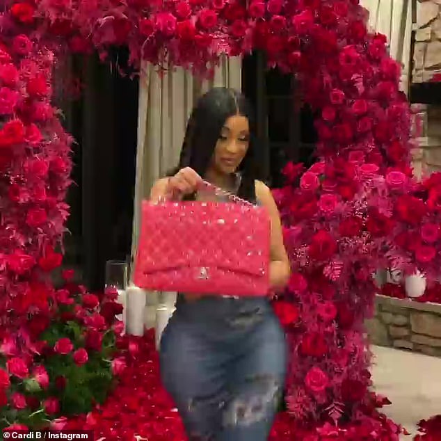 spoiled!  Cardi couldn't believe her eyes as she was given six gorgeous Chanel handbags, including one not available in the US