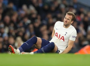 Harry Kane takes a hit after supporting Rodri.