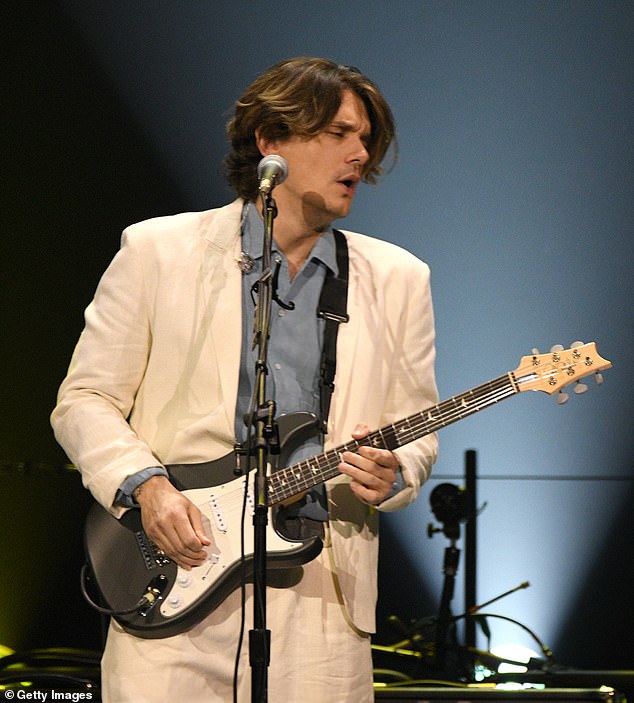 The latest: John Mayer, 44, announced Thursday that he has tested positive for COVID-19, leading to the postponement of four shows.  He was captured earlier this week playing at Madison Square Garden in New York City