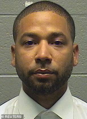Smollett in his booking photo on Thursday