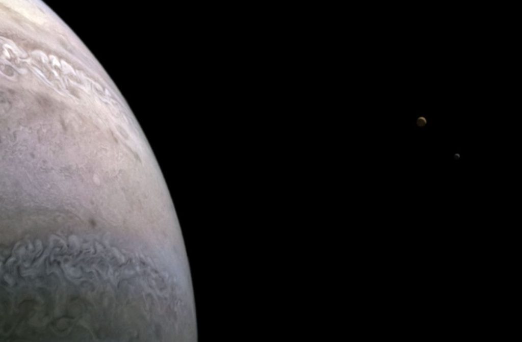 NASA's Spacecraft Takes a Stunning New Image of Jupiter's Moons Io and Europa