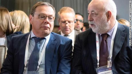 Russian businessman Mikhail Fridman, left, and businessman Viktor Vekselberg speak during a conference in Moscow on September 17, 2019. 