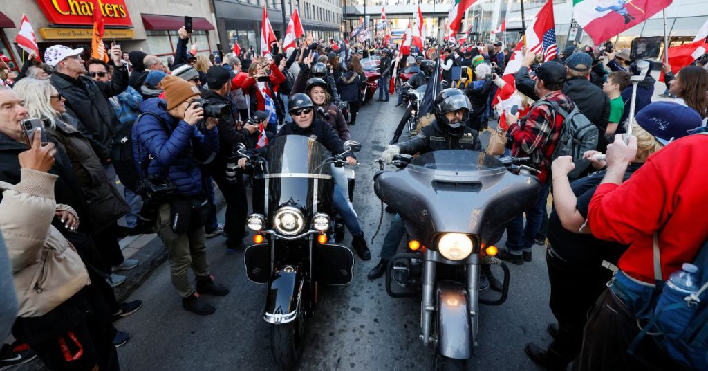 Police arrest several in the Canadian capital as a parade turns into unruly cyclists