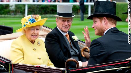 Prince Harry is pictured with his grandparents Queen Elizabeth II and Prince Philip, Duke of Edinburgh in 2016 in Ascot, England.