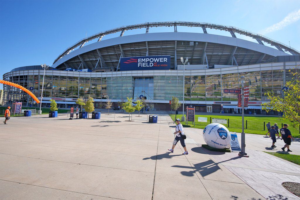 A woman dies after falling from an escalator after a Kenny Chesney concert at Empower Field at Mile High in Denver, Colo.