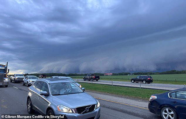 The Marquis posted an image of the sky as the storm passed in the distance.  Some cars passed unchanged