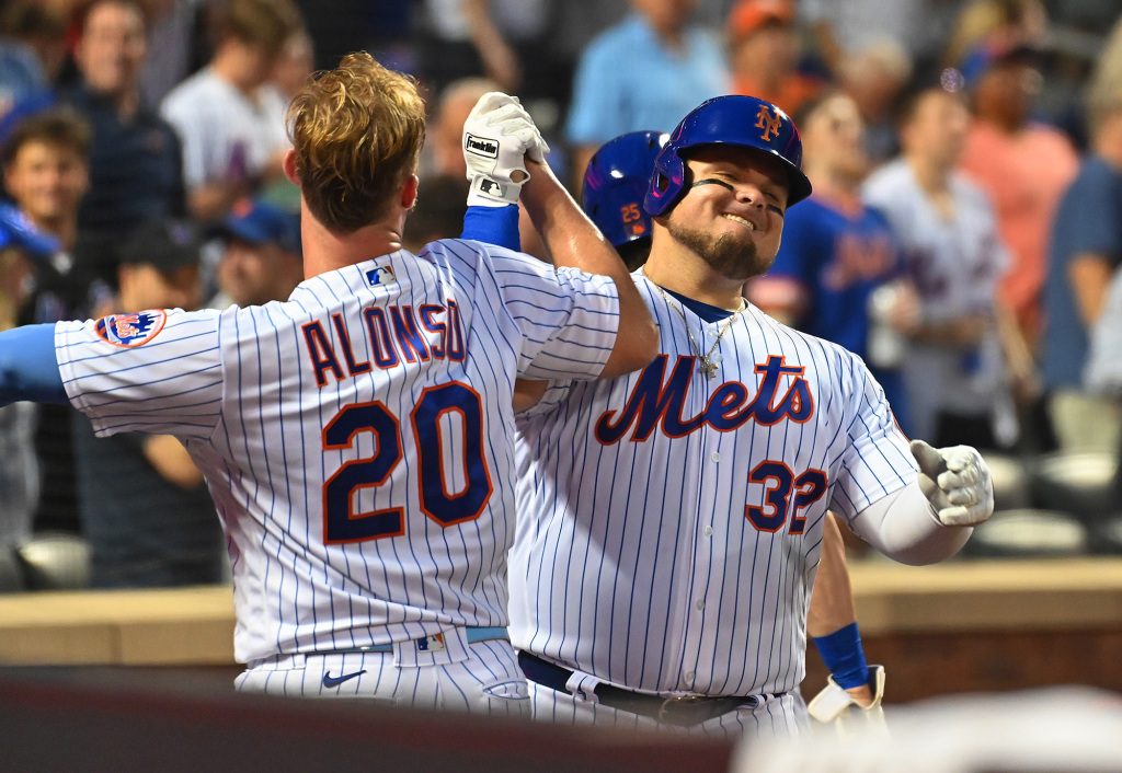 Daniel Vogelbach, right, celebrates with Pete Alonso after his home run.