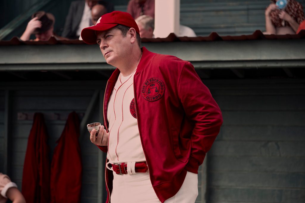 Nick Offerman in a baseball uniform. 