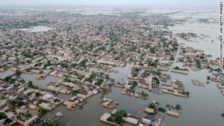 This aerial photograph, taken on September 1, 2022, shows flooded residential areas in Dera Allah Yar town in Jafarabad District, Balochistan Province.