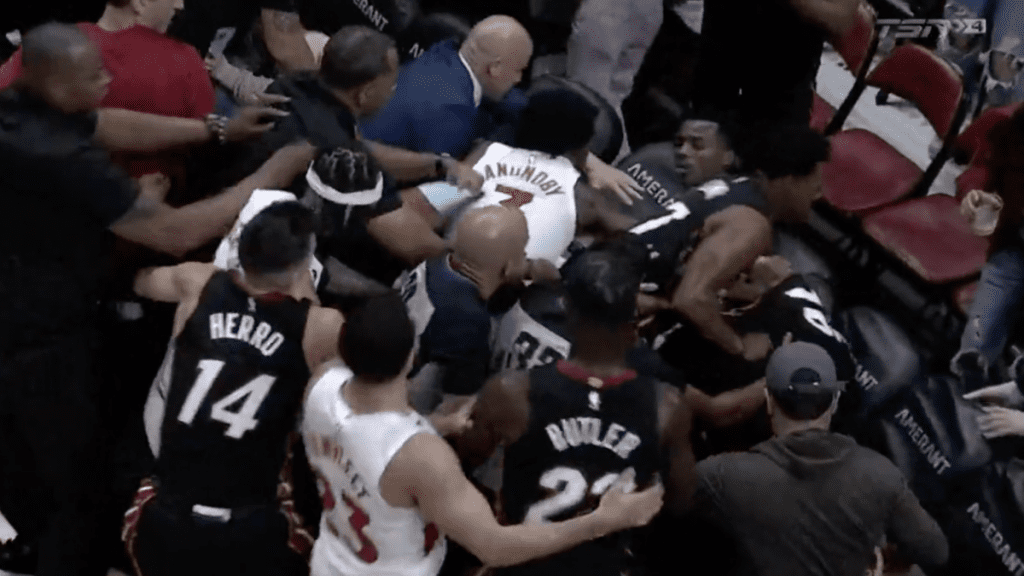 A late strike on the Raptors' rookie Koloko sparks a violent brawl against the Heat