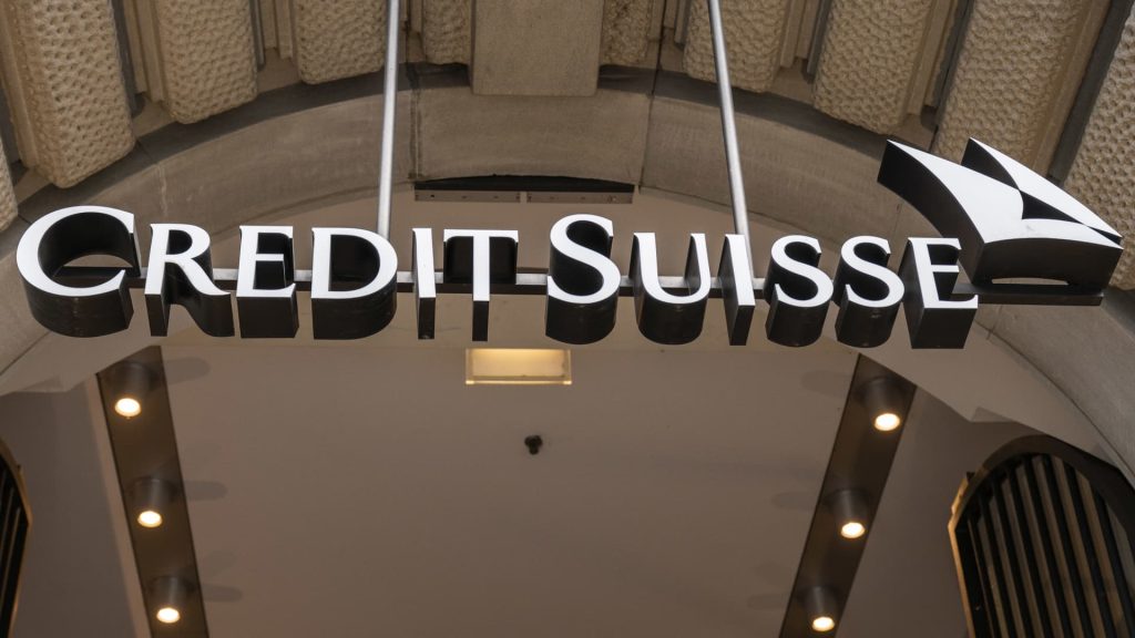 Credit Suisse buys back $3 billion in debt and sells hotel as credit worries persist