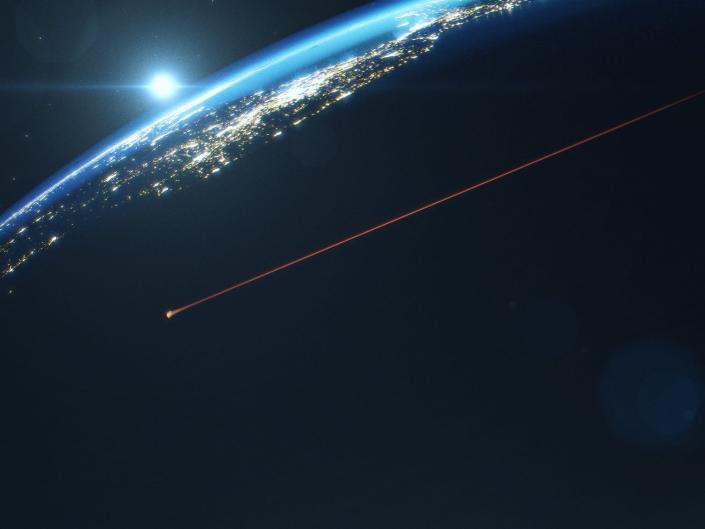 The illustration shows the Orion capsule as a fireball heading toward Earth