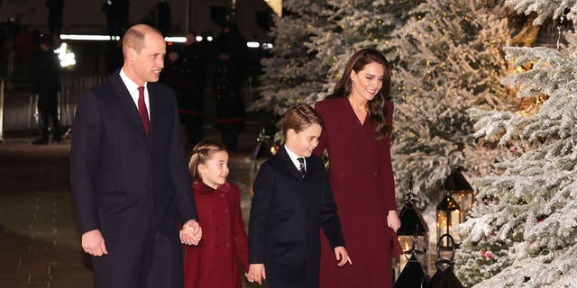 Prince William, Prince of Wales;  Princess Charlotte of Wales;  Prince George of Wales;  and Catherine, Princess of Wales, is in attendance "together at Christmas" Carol service in Westminster Abbey 15th December 2022 in London.
