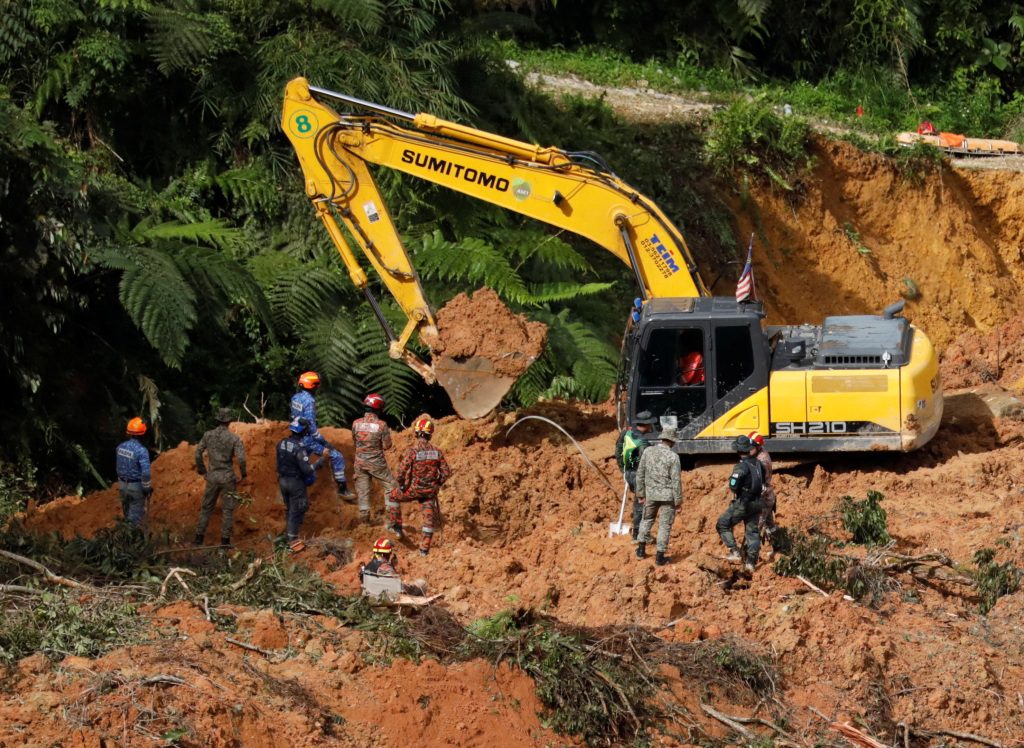 Landslides swept through a camp early Friday morning, 30 miles from the Malaysian capital.