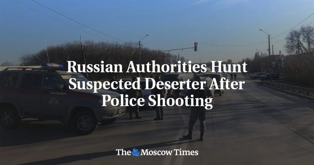 Russian authorities are pursuing a suspected fugitive after he was shot by police